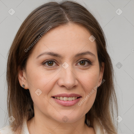 Joyful white adult female with medium  brown hair and brown eyes