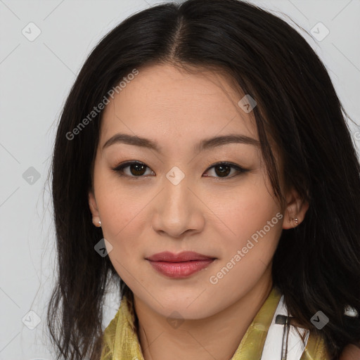 Joyful asian young-adult female with long  brown hair and brown eyes