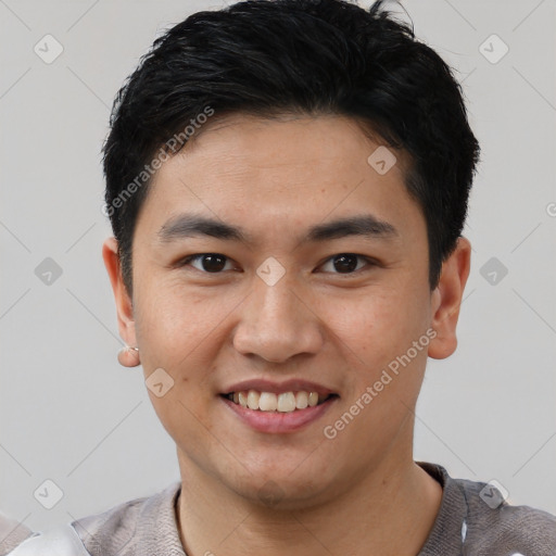 Joyful white young-adult male with short  black hair and brown eyes