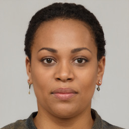 Neutral black young-adult female with short  brown hair and brown eyes