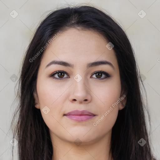 Joyful latino young-adult female with long  brown hair and brown eyes