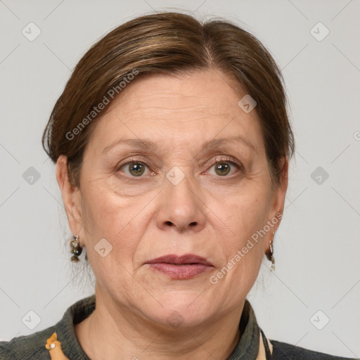 Joyful white adult female with medium  brown hair and grey eyes