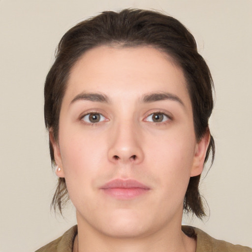 Neutral white young-adult female with medium  brown hair and brown eyes