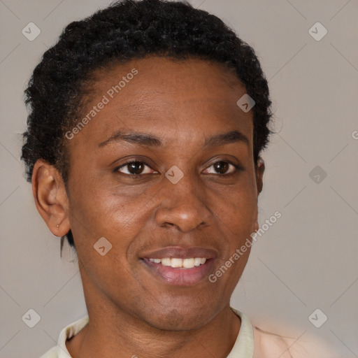 Joyful black adult female with short  brown hair and brown eyes