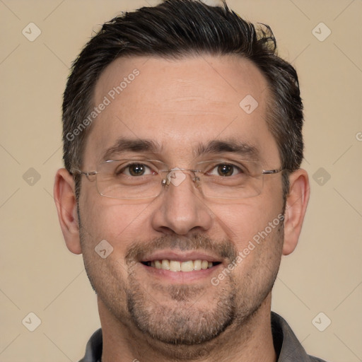 Joyful white adult male with short  brown hair and brown eyes