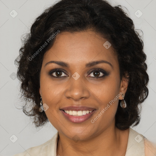 Joyful black young-adult female with long  brown hair and brown eyes