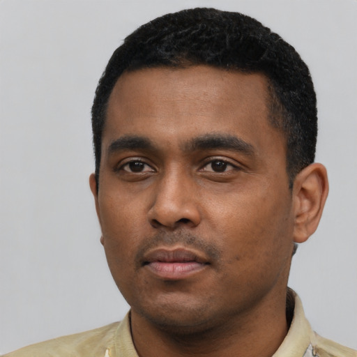 Neutral black young-adult male with short  black hair and brown eyes