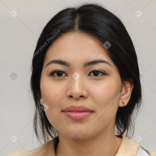 Joyful asian young-adult female with medium  black hair and brown eyes