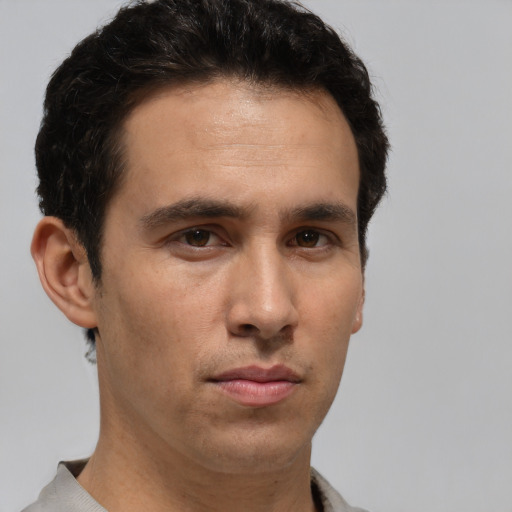 Neutral white adult male with short  brown hair and brown eyes