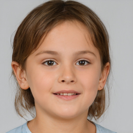 Joyful white child female with medium  brown hair and brown eyes