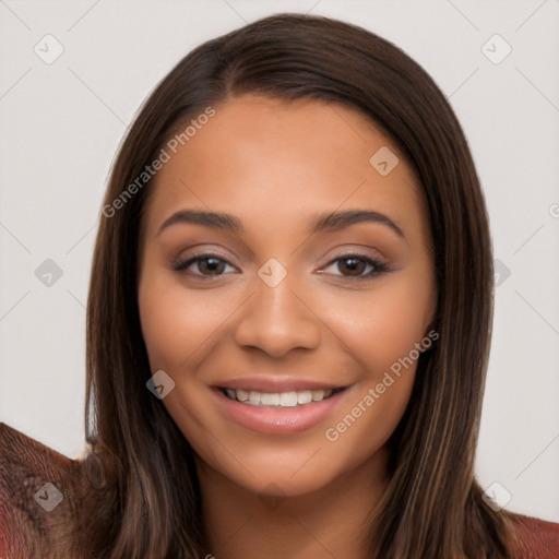 Joyful latino young-adult female with long  brown hair and brown eyes