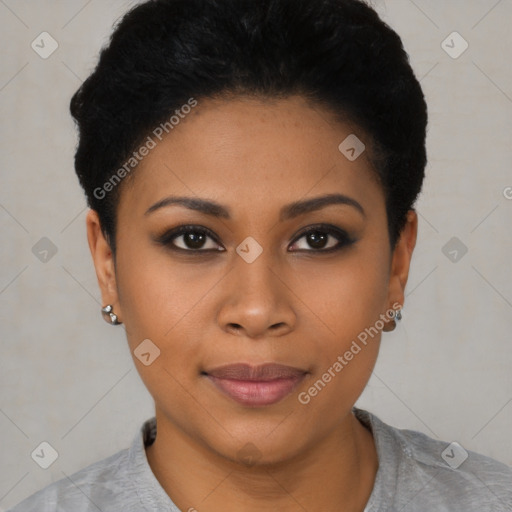 Joyful black young-adult female with short  black hair and brown eyes