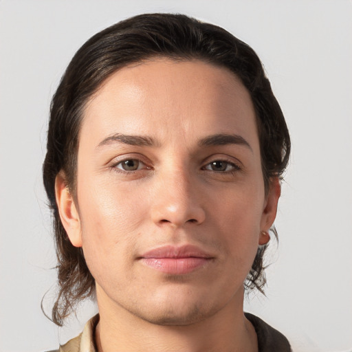 Joyful white young-adult female with medium  brown hair and brown eyes