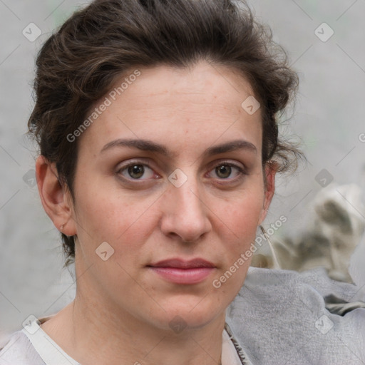 Joyful white adult female with short  brown hair and grey eyes