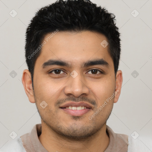 Joyful latino young-adult male with short  black hair and brown eyes