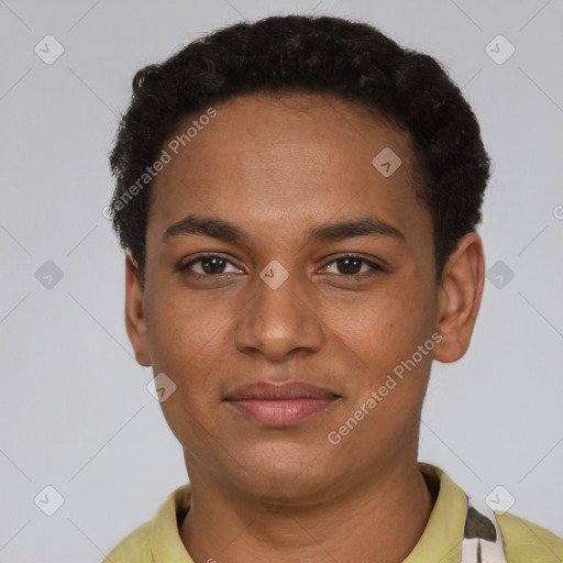 Joyful black young-adult female with short  brown hair and brown eyes