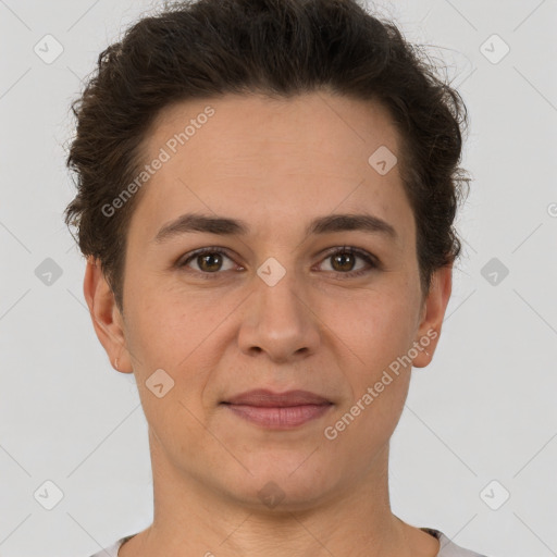 Joyful white adult female with short  brown hair and brown eyes