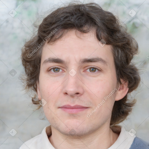 Joyful white young-adult male with medium  brown hair and brown eyes