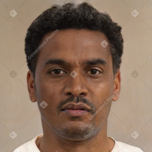 Neutral black young-adult male with short  brown hair and brown eyes