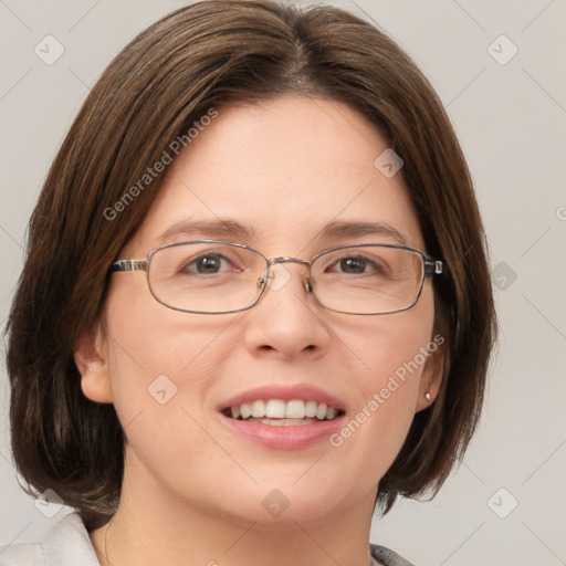 Joyful white adult female with medium  brown hair and grey eyes