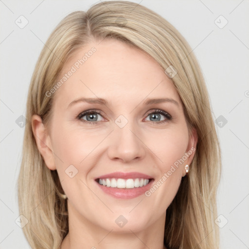 Joyful white young-adult female with long  brown hair and blue eyes