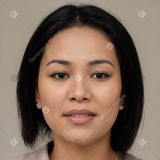 Joyful asian young-adult female with medium  black hair and brown eyes