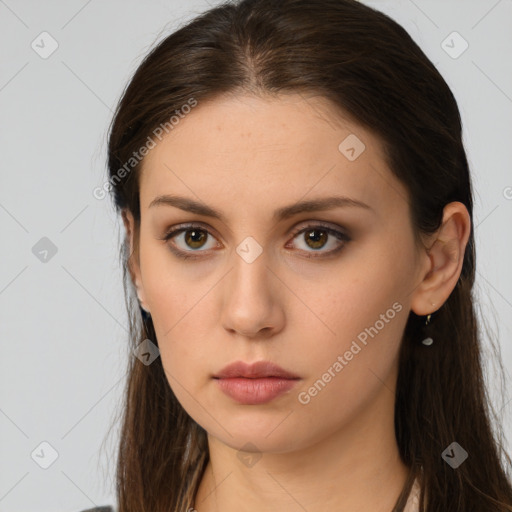 Neutral white young-adult female with long  brown hair and brown eyes