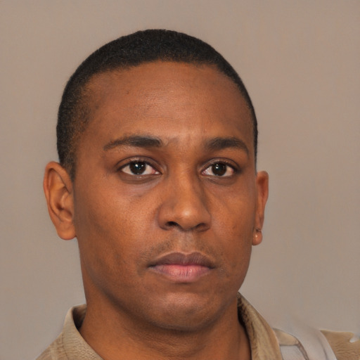 Neutral black young-adult male with short  brown hair and brown eyes