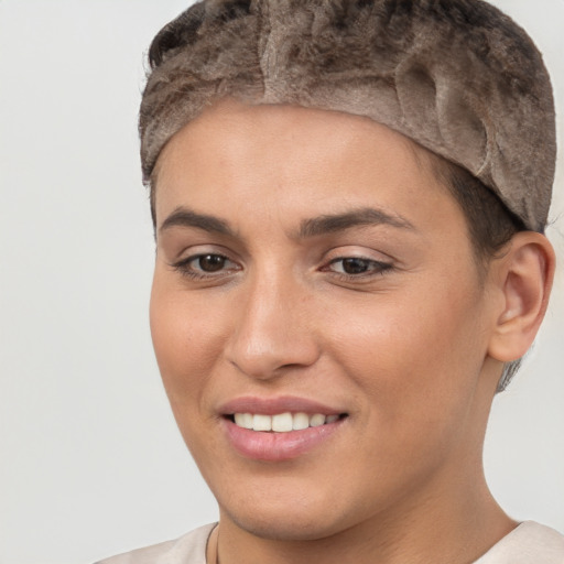 Joyful white young-adult female with short  brown hair and brown eyes