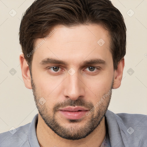 Neutral white young-adult male with short  brown hair and brown eyes