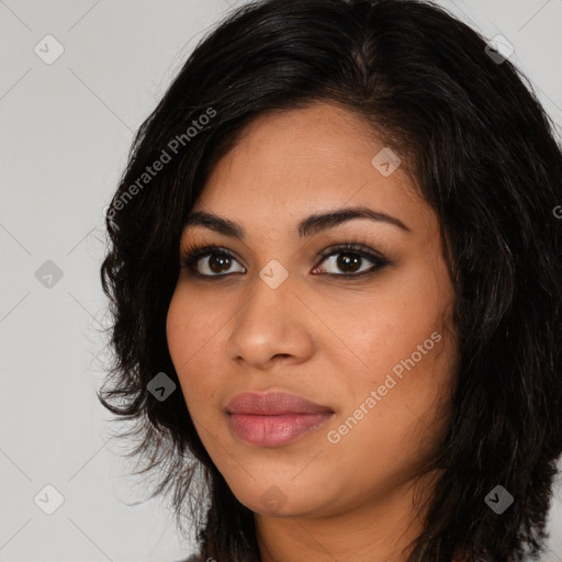 Joyful latino young-adult female with long  black hair and brown eyes