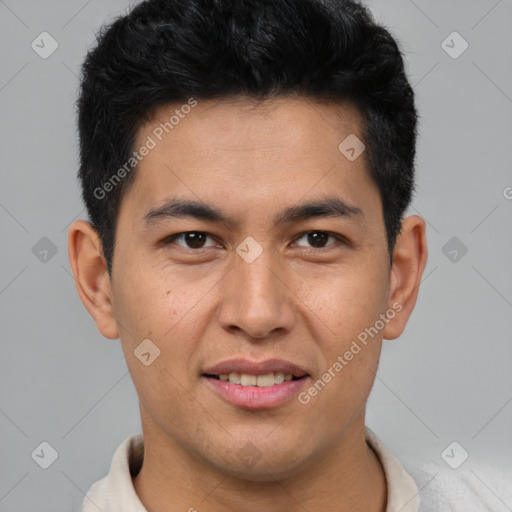 Joyful latino young-adult male with short  brown hair and brown eyes