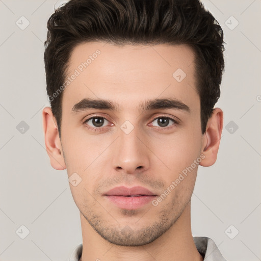 Neutral white young-adult male with short  brown hair and brown eyes