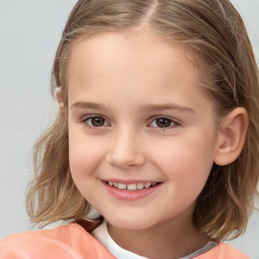 Joyful white child female with medium  brown hair and brown eyes