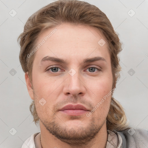 Joyful white adult male with short  brown hair and grey eyes