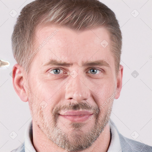 Joyful white adult male with short  brown hair and grey eyes