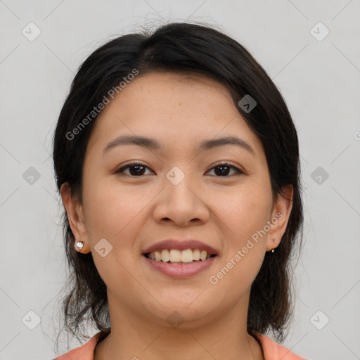 Joyful asian young-adult female with medium  brown hair and brown eyes