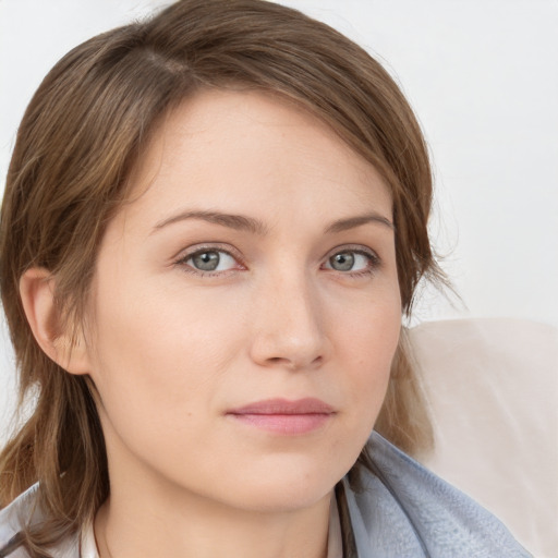 Neutral white young-adult female with medium  brown hair and grey eyes