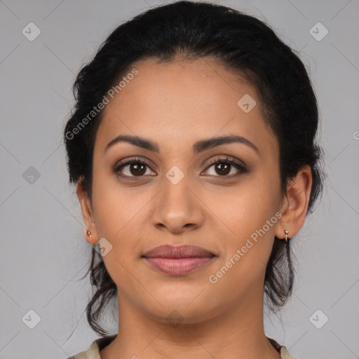 Joyful latino young-adult female with medium  brown hair and brown eyes