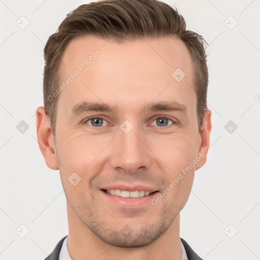 Joyful white young-adult male with short  brown hair and brown eyes