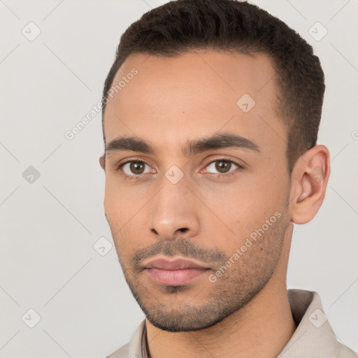 Neutral white young-adult male with short  brown hair and brown eyes