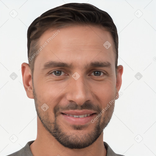 Joyful white young-adult male with short  brown hair and brown eyes