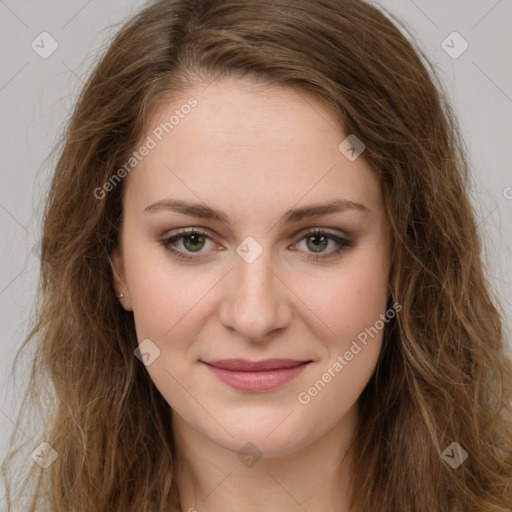 Joyful white young-adult female with long  brown hair and green eyes