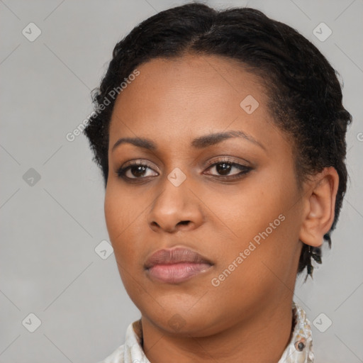 Neutral black young-adult female with short  brown hair and brown eyes