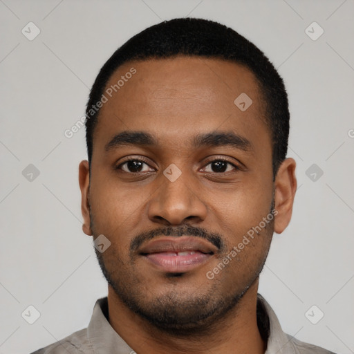 Neutral black young-adult male with short  black hair and brown eyes