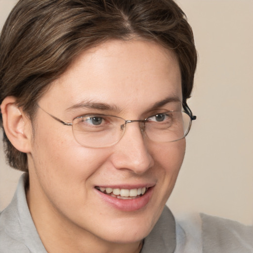 Joyful white adult female with short  brown hair and brown eyes