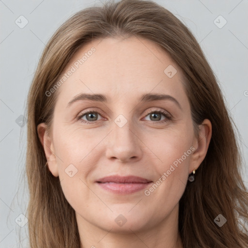 Joyful white young-adult female with long  brown hair and grey eyes