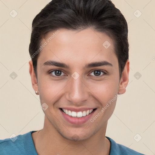 Joyful white young-adult male with short  brown hair and brown eyes