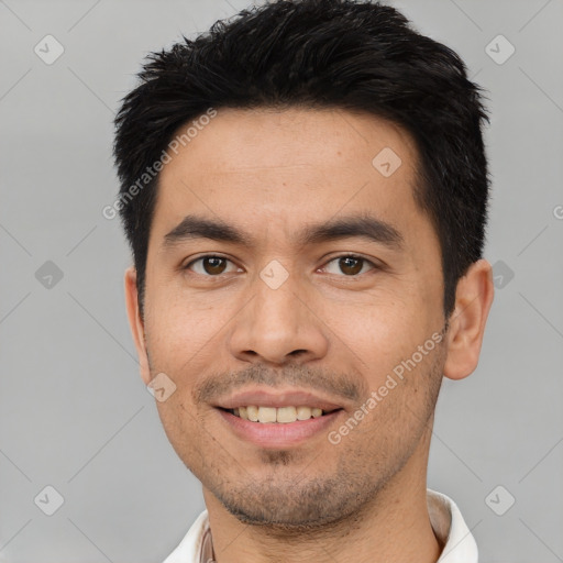 Joyful white young-adult male with short  black hair and brown eyes