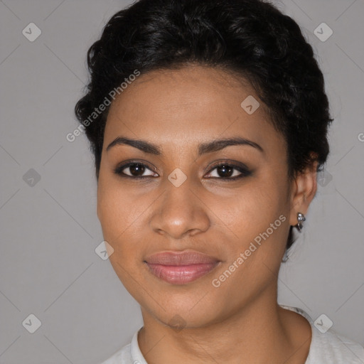 Joyful black young-adult female with short  brown hair and brown eyes